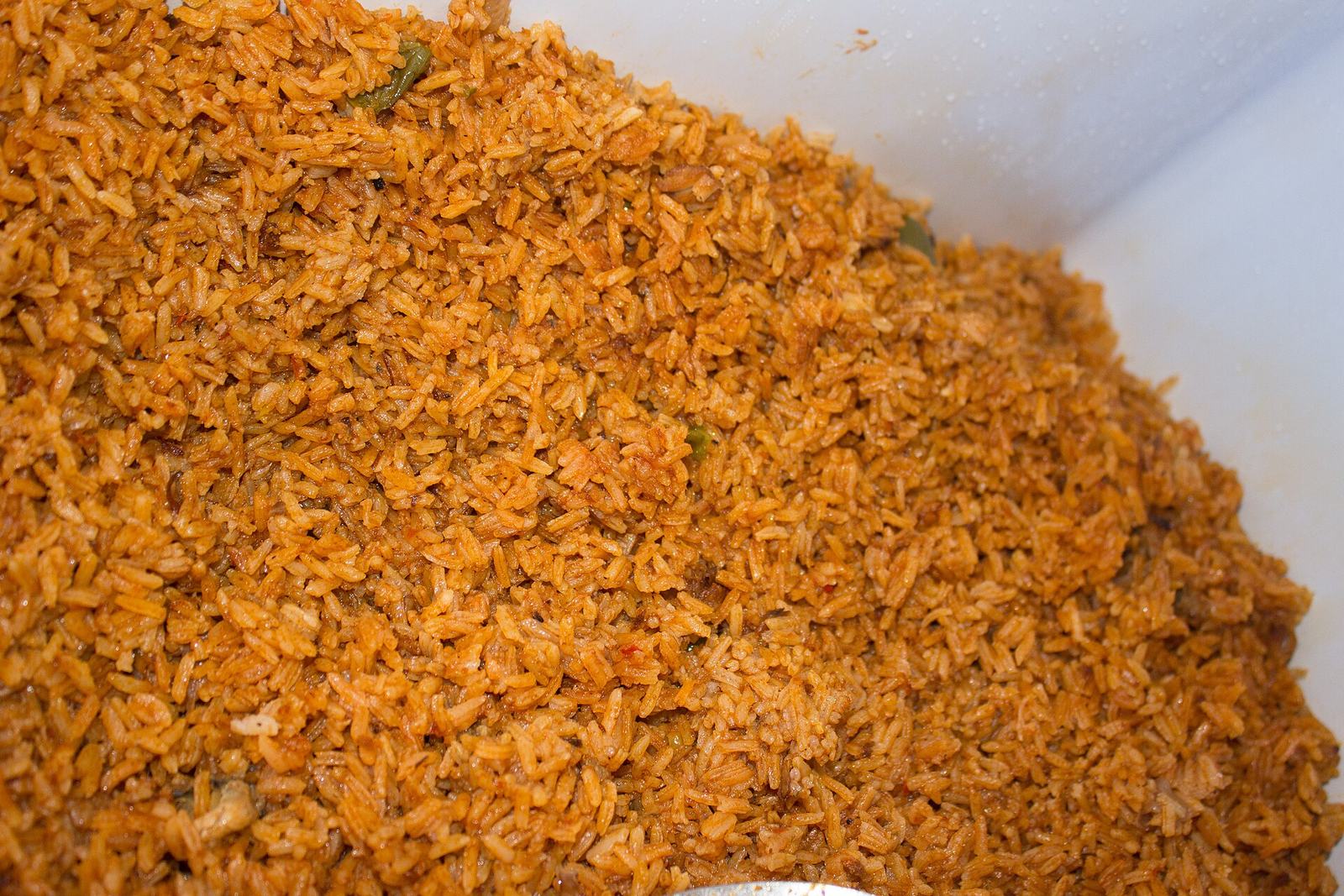 Jollof rice with peppered meat and plantain